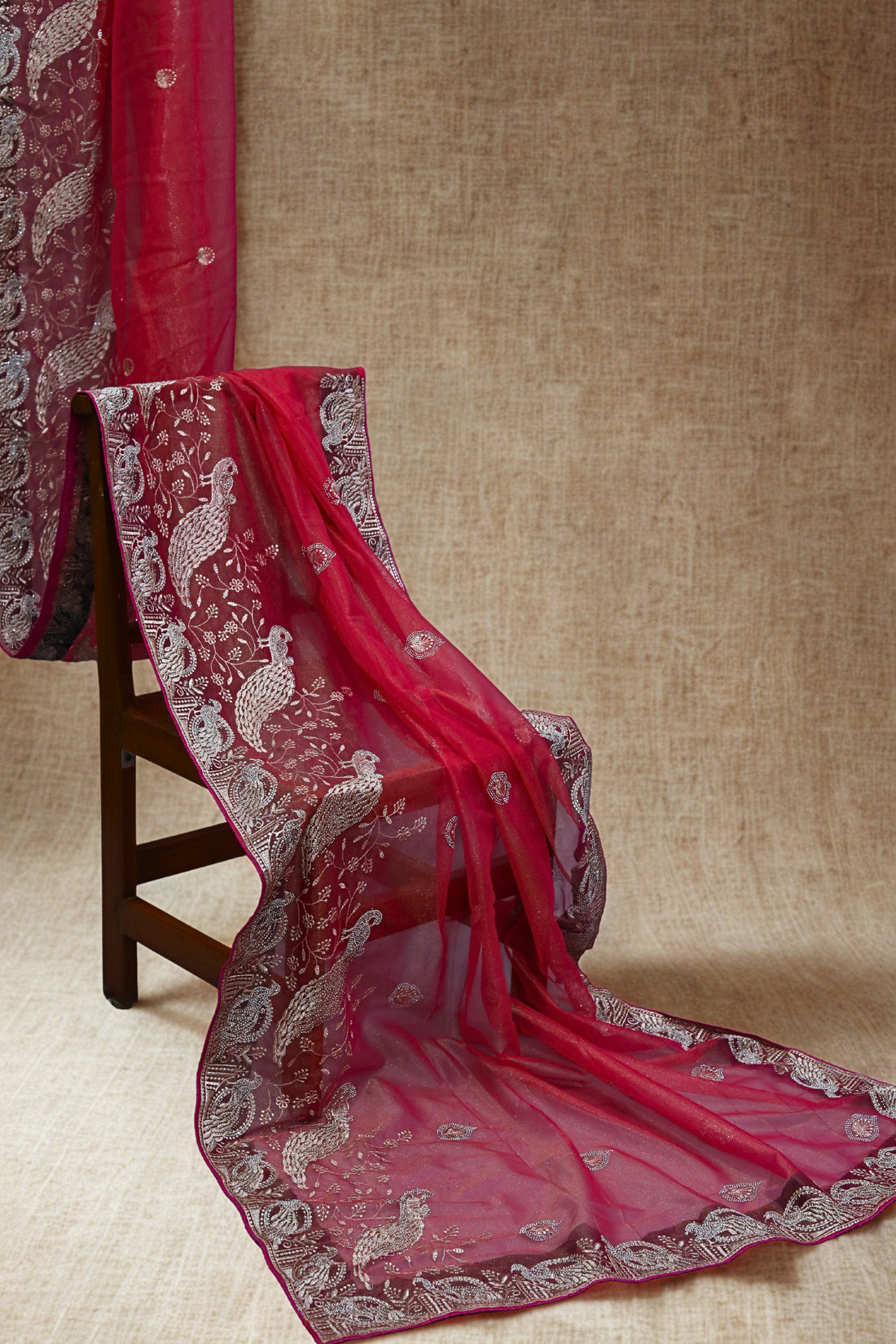 Deep Raspberry Pink Organza Tissue Saree with Peacock Border