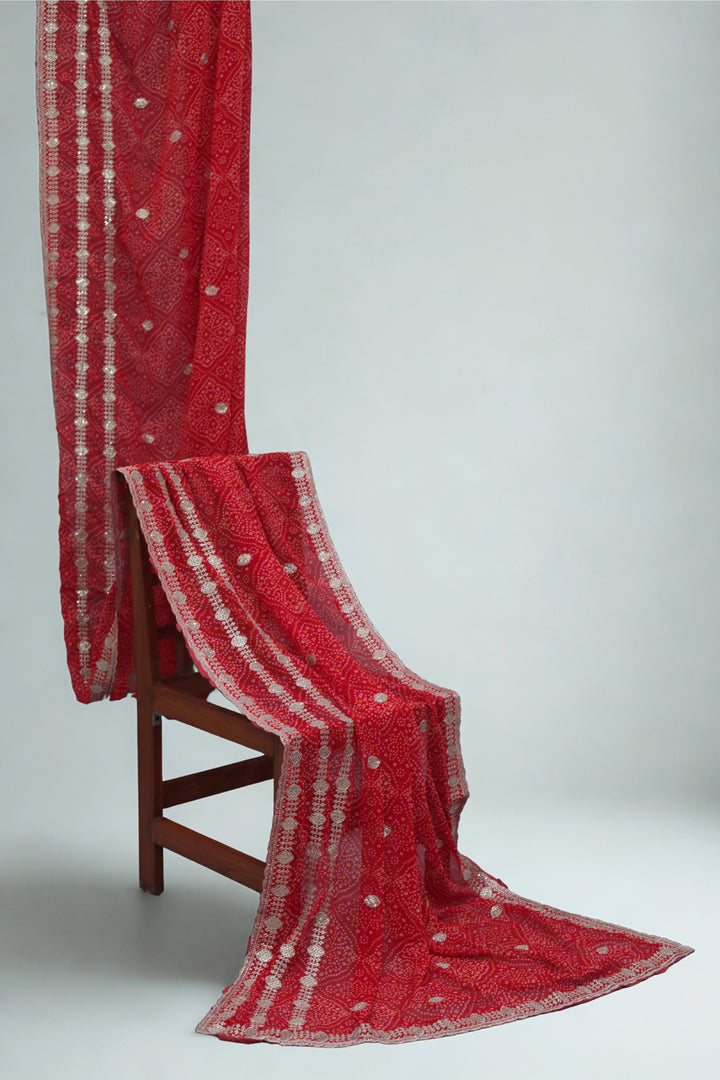 ISHNA Red Bandhani Saree With 3 Line Border and Chip Work