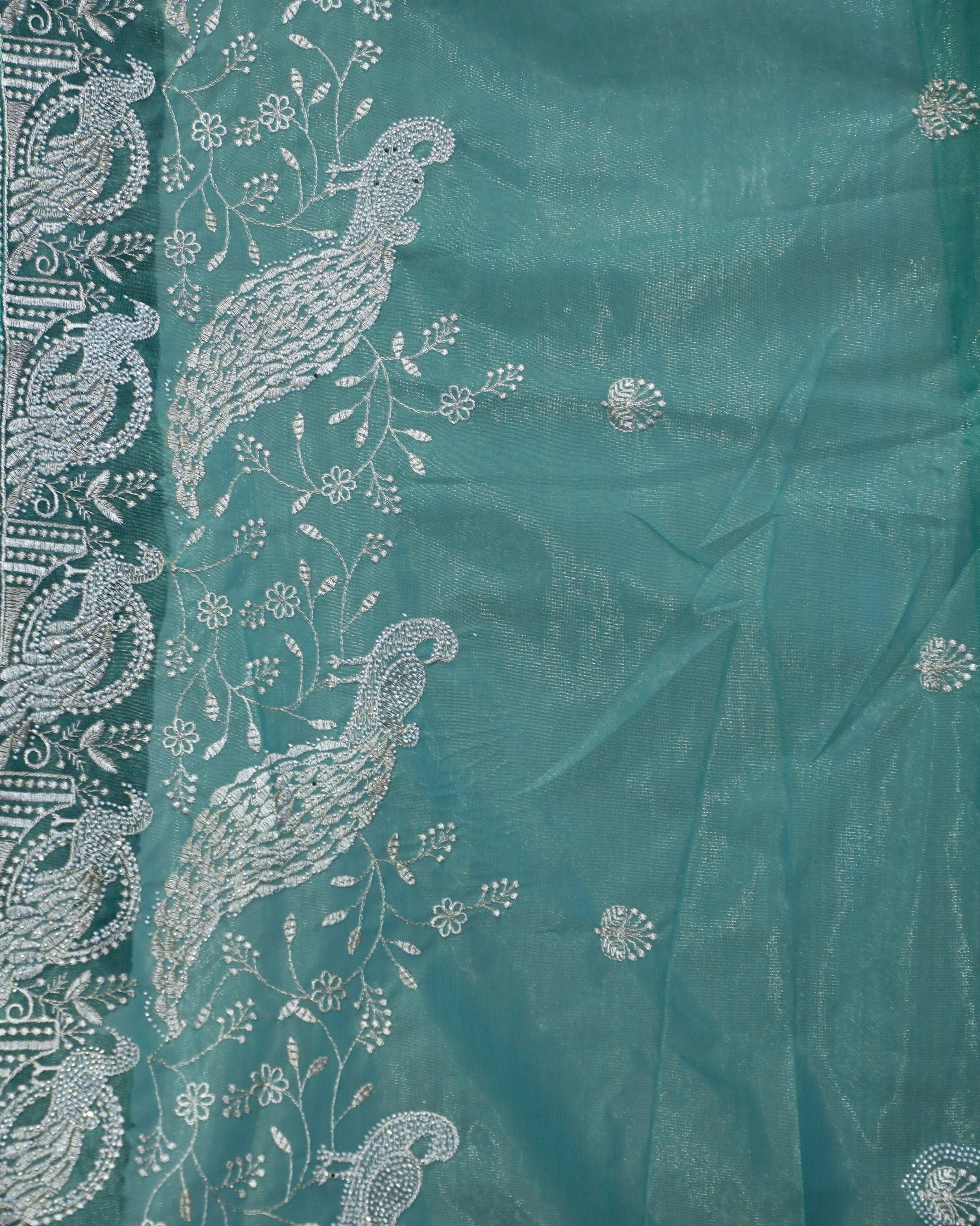Sea Green Oganza Tissue Saree with Peacock Border