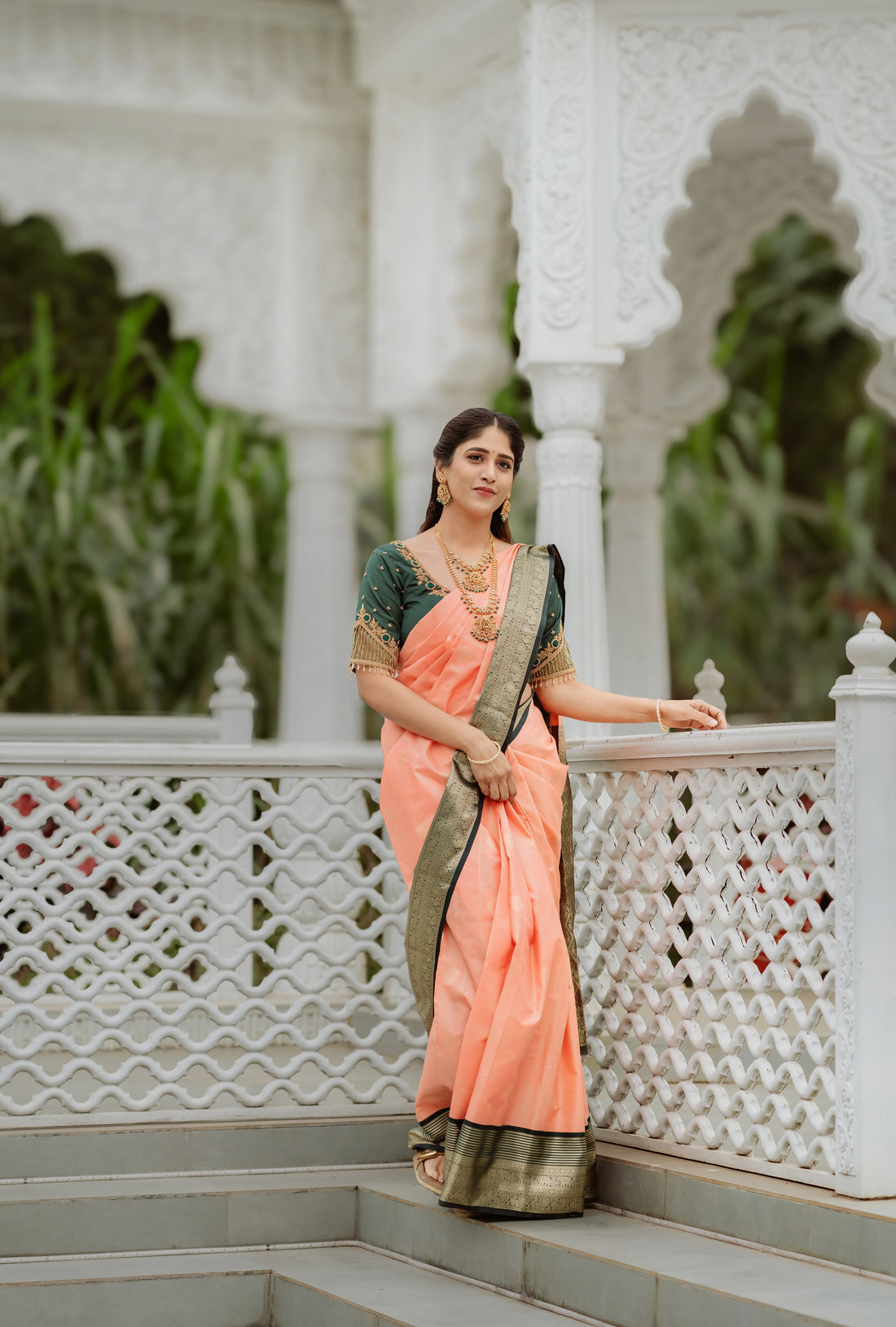 Kanchipuram (Kanchi) Silk Saree with soft peach and dark green border  antique gold zari